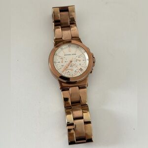 Michael Kors unisex rose gold Watch white classic dial wide band
